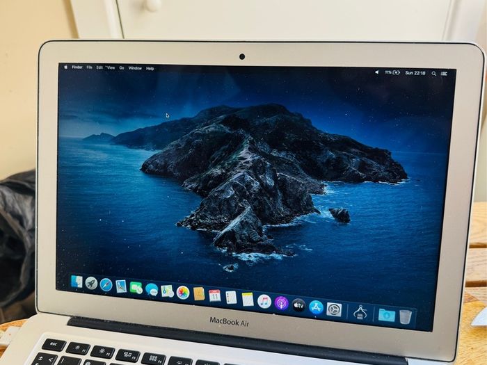 MacBook Air working perfect charger included.