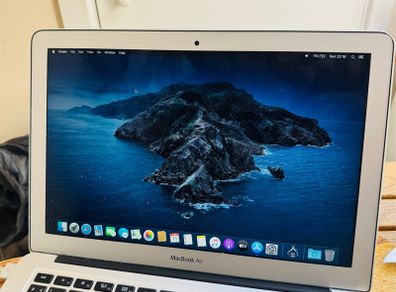MacBook Air working perfect charger included.