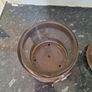Two rustic pillar candleholders with glass inserts Image 2