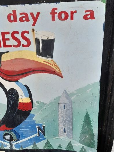 Vintage Hand Painted Guinness Sign