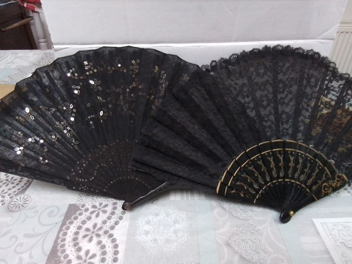 Two black vintage  fans