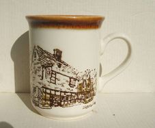 A finely-made rustic scenes mug made by STL of Staffordshire (early 1990's)