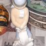 Old Ornament of a Boy in a Winter Hat and Light Colored Clothing on Skis, Made in Spain. Image 4