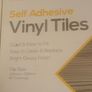 Greyish stick on Vinyl floor tiles  6 unused packs available Image 2