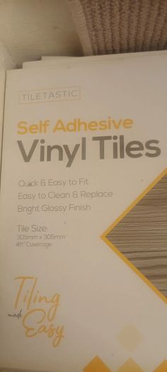 Greyish stick on Vinyl floor tiles  6 unused packs available