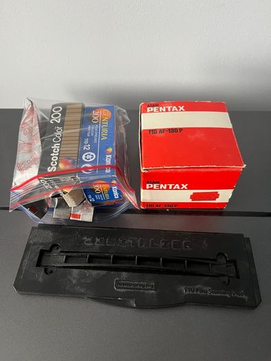 3 Pentax Auto 110 film cameras and accessories boxed