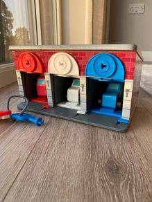 Melissa & Doug Wooden Lock & Roll Rescue Garage Set