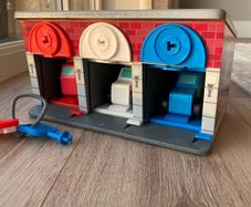 Melissa & Doug Wooden Lock & Roll Rescue Garage Set
