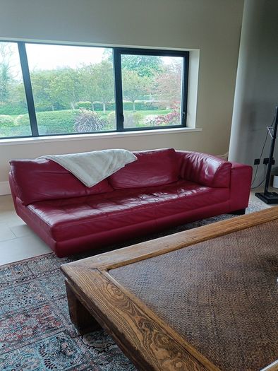 Natuzzi red leather corner sofa or can be separate as shown