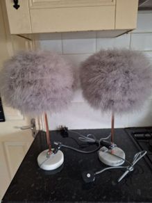 A pair of marble based feather table lamps