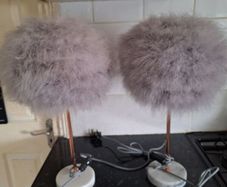 A pair of marble based feather table lamps