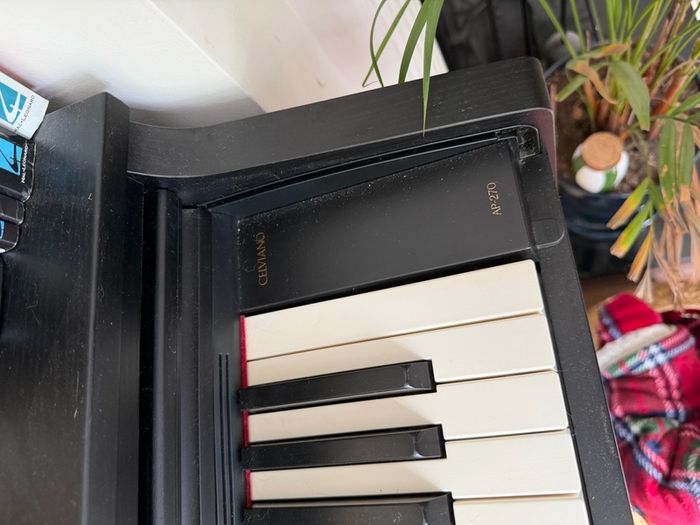 Electric piano Casio Celviano AP270 with adjustable stool