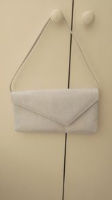 LK Bennett White and Ice blue lizard-effect leather clutch bag. Made in Italy.