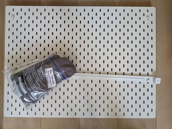 Ikea pegboard including wall attachments and accessories