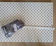 Ikea pegboard including wall attachments and accessories
