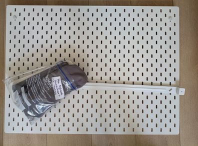 Ikea pegboard including wall attachments and accessories