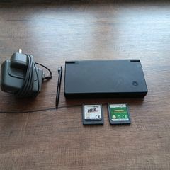 nintendo Ds console with charger, 2 games and stylus