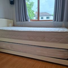 Single bed with guest bed