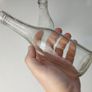 219 - Set of 2 Vintage Clear Glass Decorative Collectible Bottles Image 2