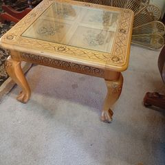 Vintage carved side table with glass cover