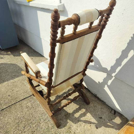 Swinging antique armchair