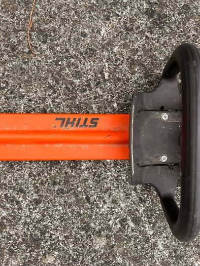 STIHL HS 45 petrol hedge trimmer with 24-inch double-sided cutting blade.
