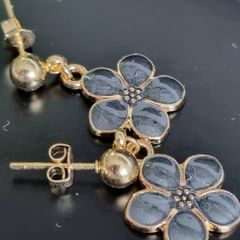 Gold plated pin earrings with enamel flowers pendants