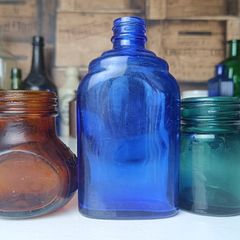 465 - Set of Three Beautiful Vintage Glass Decorative Collectible Bottles - Amber Eire Bovril, Cobalt Blue Magnesia and Turquoise Science Cream