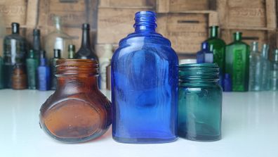 465 - Set of Three Beautiful Vintage Glass Decorative Collectible Bottles - Amber Eire Bovril, Cobalt Blue Magnesia and Turquoise Science Cream