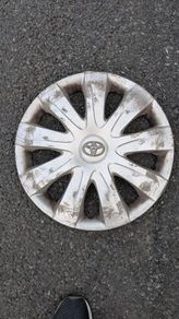 Toyota original 15" fifteen inch wheel trim