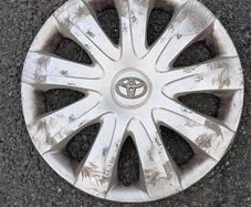 Toyota original 15" fifteen inch wheel trim