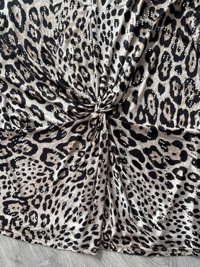 ladies top  shiny design all through it