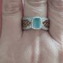 A classic ring with a  grandidierite and stones, crafted from 925 sterling silver with a platinum finish. Image 5