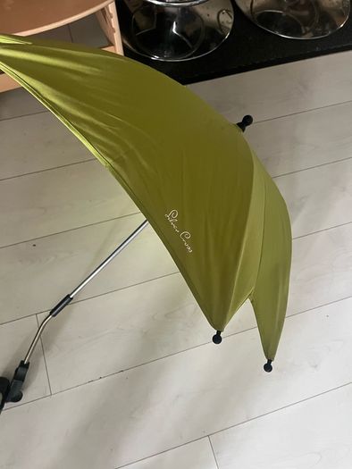 Red and green baby parasols