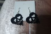 black melting heart skull earrings