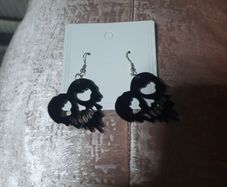 black melting heart skull earrings