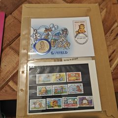 Garfield the cat half dollar and stamps