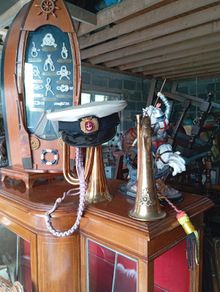 Vintage bugle and naval hat