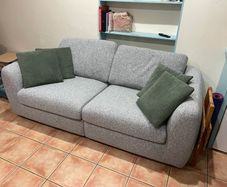2 seater sofa with pillows