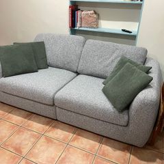 2 seater sofa with pillows