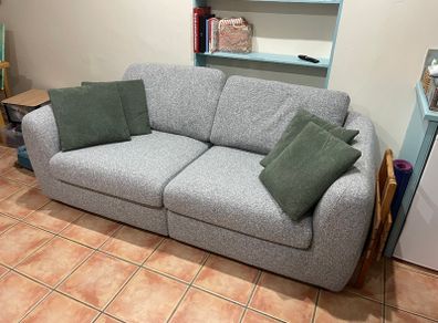 2 seater sofa with pillows