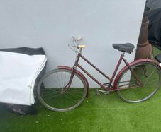 Vintage Triumph roadster (maroon, ladies step-through)