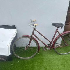 Vintage Triumph roadster (maroon, ladies step-through)