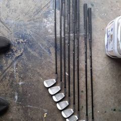 full set of graphite clubs (4 to sw)bag and trolley