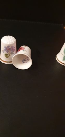 Collection of Flower Themed Gold Coloured Edged Thimbles