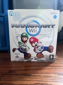 Mario Kart Wii with box and wheel