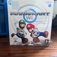 Mario Kart Wii with box and wheel