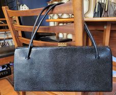 Exclusive Waldy bag reptile skin with shocking pink inside