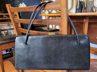 Exclusive Waldy bag reptile skin with shocking pink inside
