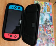 Nintendo Switch Oled + Games + Case